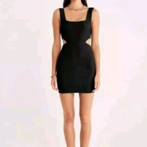 Rumer the Label sz M black mini cocktail dress with cutouts. Made in Australia.